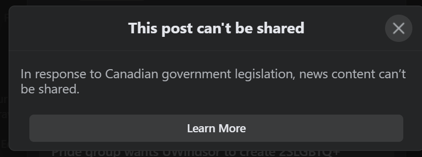 a screenshot of Meta's warning when trying to share a link from a news website